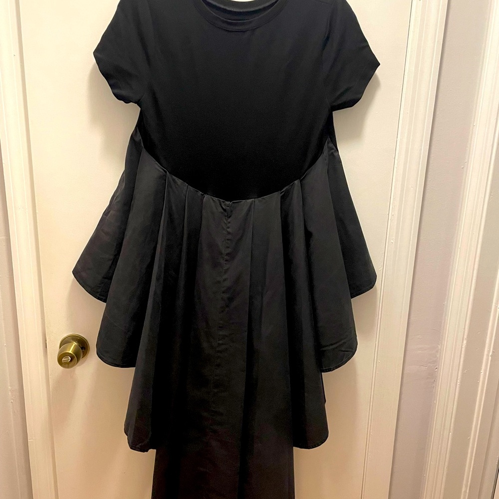 Black Gracia asymmetrical top.  Soft cotton on top with a more rigid tail.